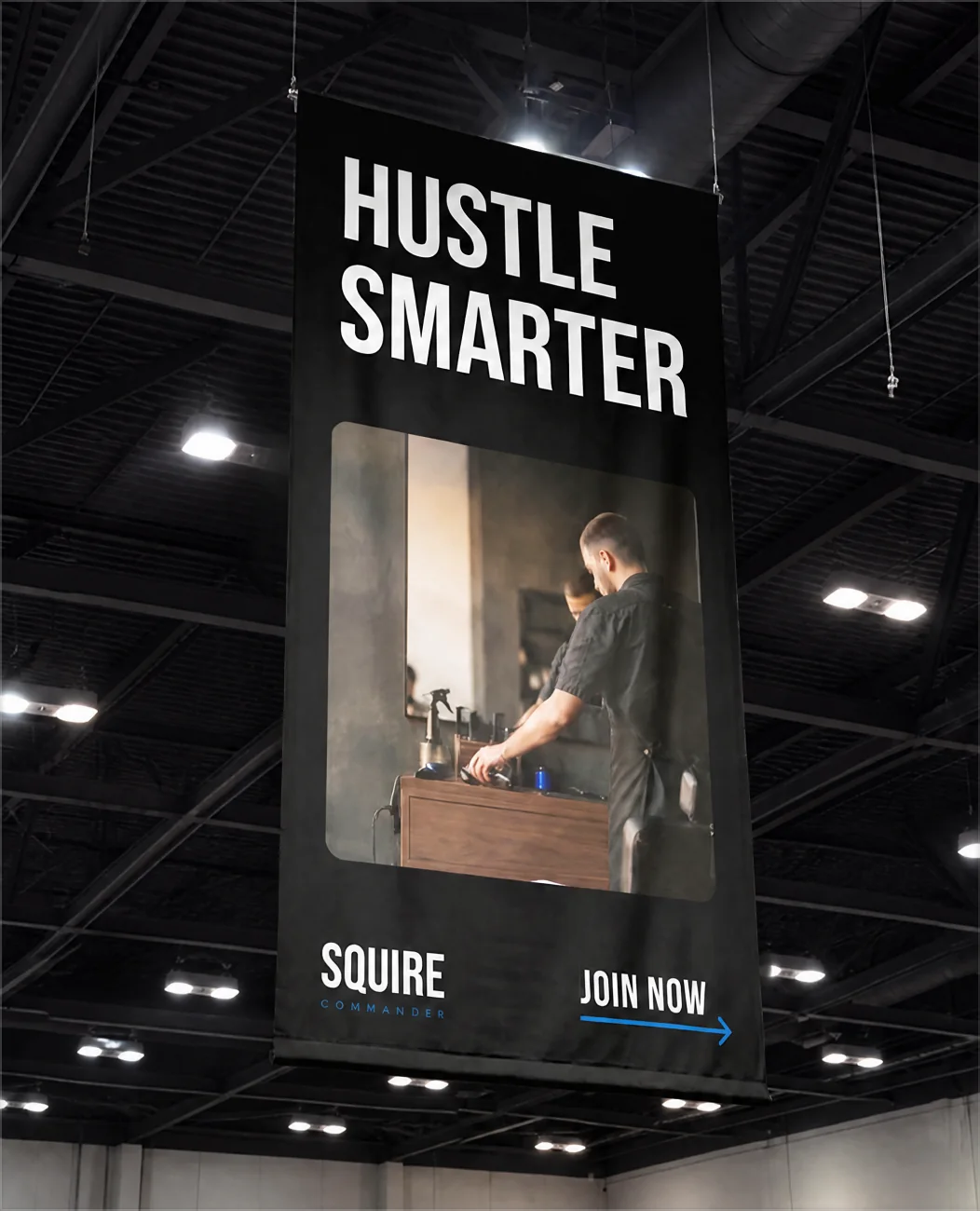 SQUIRE banner with the line Hustle Smarter at a trade show
